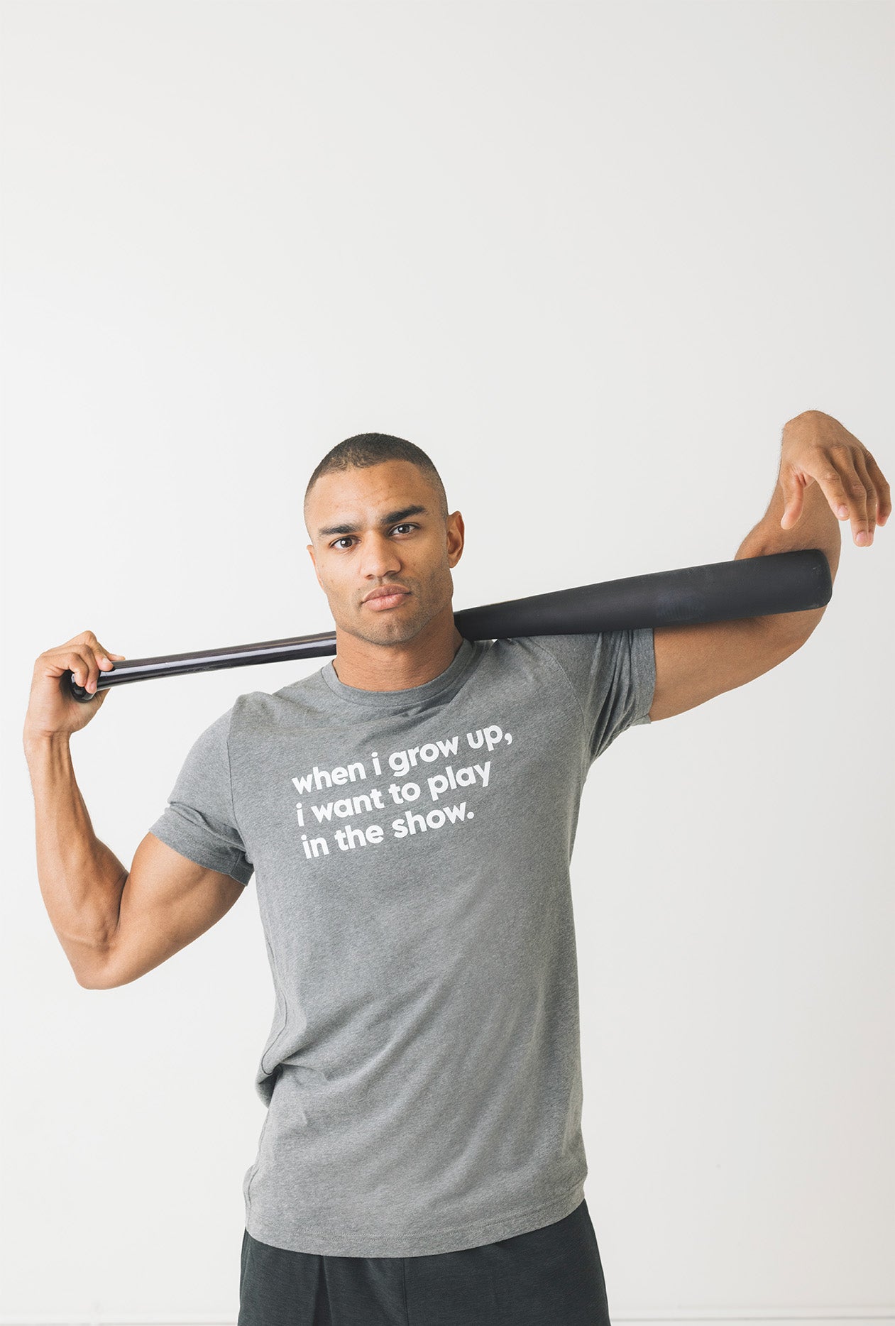 adult-when-i-grow-up-i-want-to-play-in-the-show-baseball-tee-on-man-front