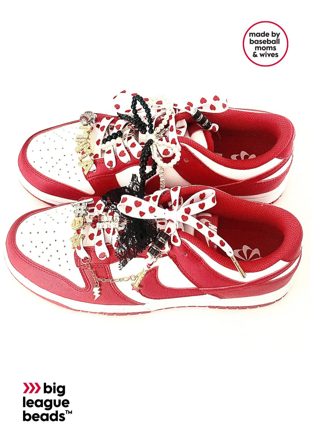 Red sandals with decorative bows on a white background, featuring 'big league beads' branding.