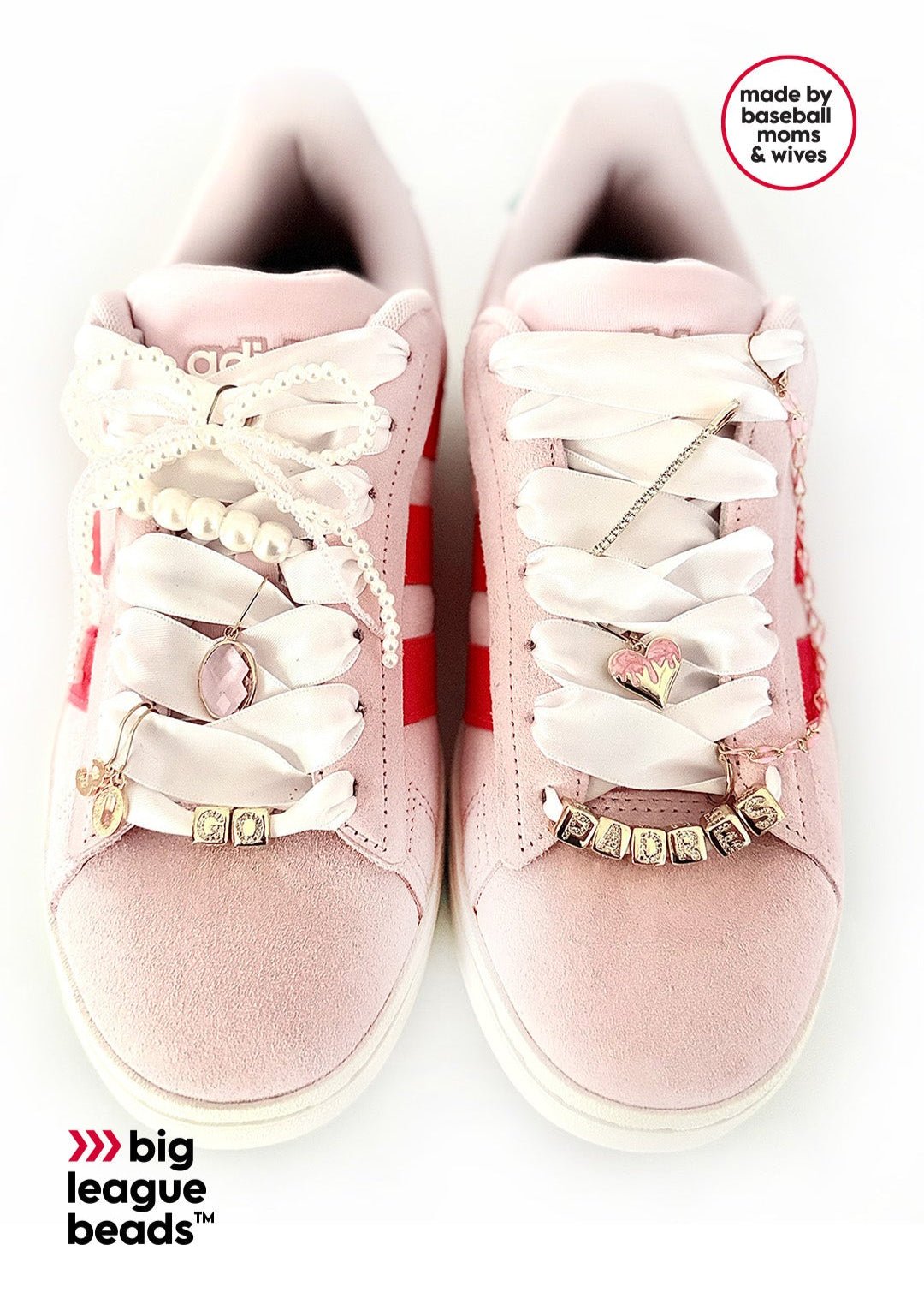 Pink sneakers with decorative beads on a white background, featuring 'big league beads' branding.