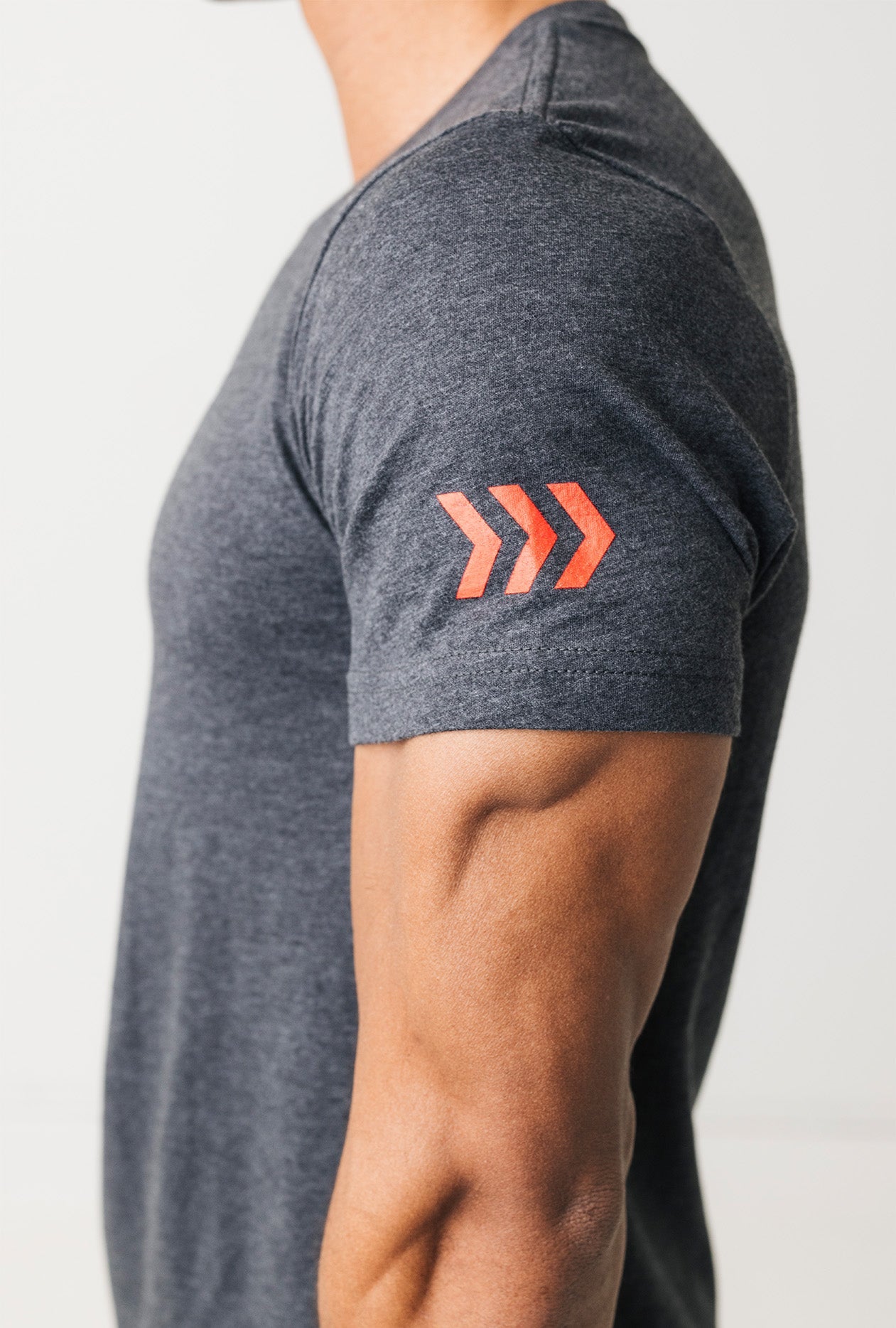 adult-knocks-tee-kelly-crew-logo-arm-close-up
