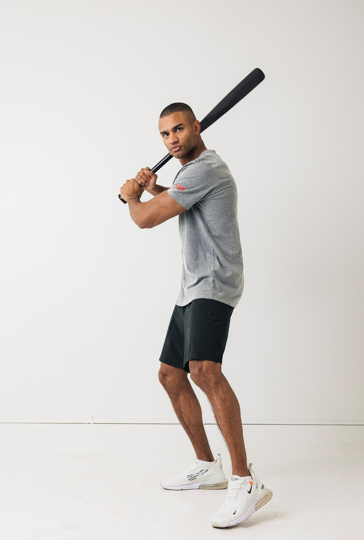 adult-on-the-bump-gray-baseball-tee-man-batting