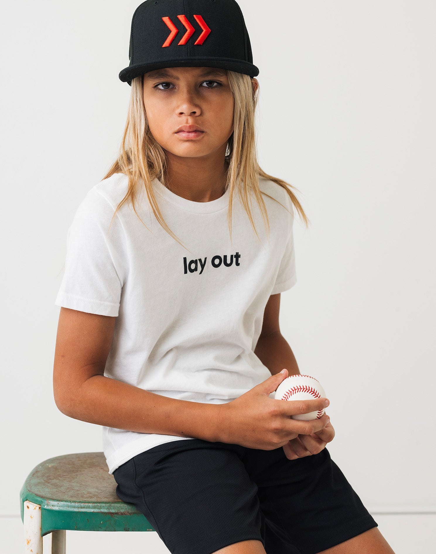 youth-lay-out-white-baseball-tee-on-kid