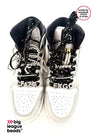Black and white sneakers with decorative beads on a white background, featuring Big League Beads branding.